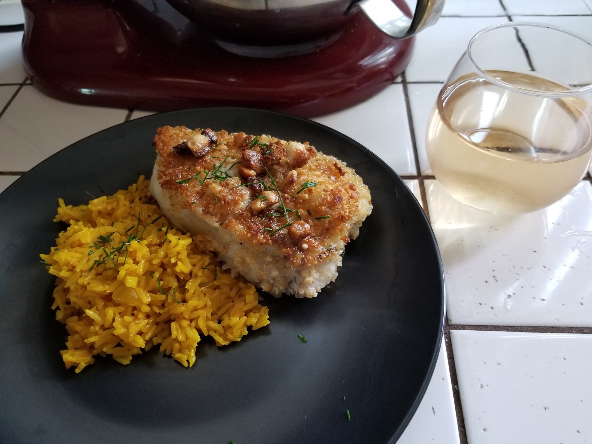 Sunday Gravy with yeah right: Macadamia crusted halibut steak. A piece of fish good enough for Jehovah.